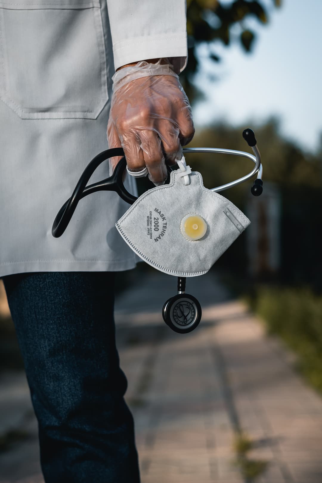 Doctor carrying a mask and stethoscope